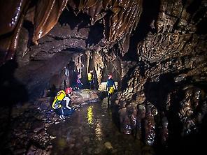 Down underground river cave Valporquero