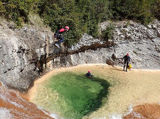 Jumping in a natural pool