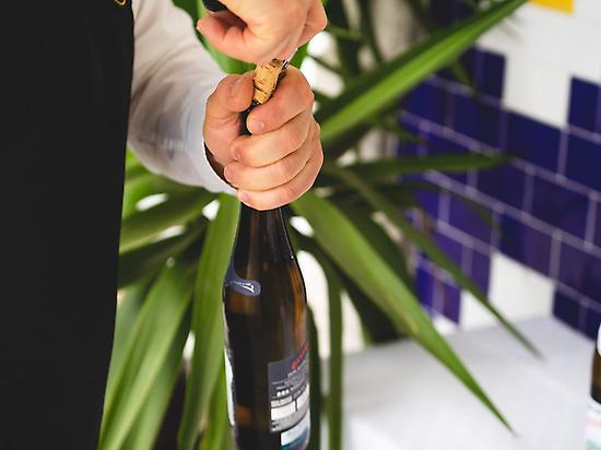 Uncorking a wine bottle