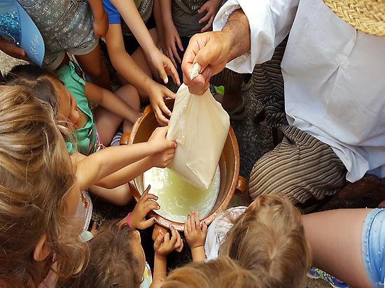 Making the traditional cheese of Menorca