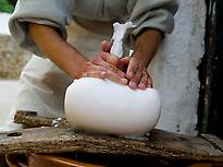 Making the traditional cheese of Menorca