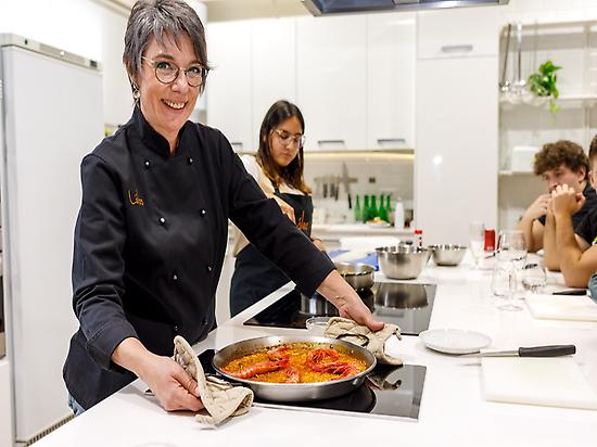 Chef Lola cooking paella