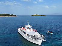 Paseo en barco con snorkel y paddle surf